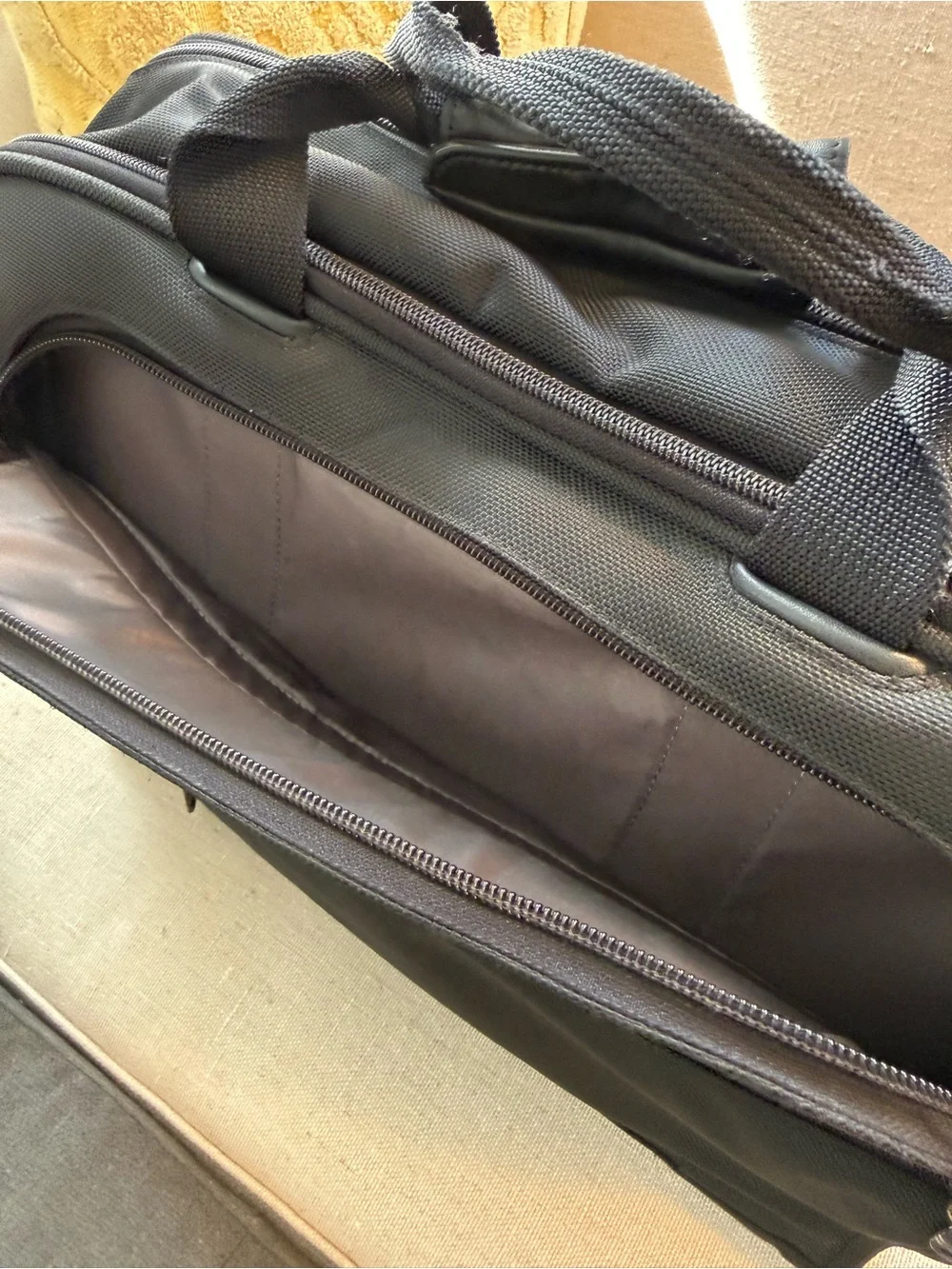 Black Men's Tumi Alpha expandable travel briefcase. Large.